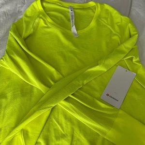 brand new never worn tags are stuff on lululemon size 14 long sleeve swiftly.